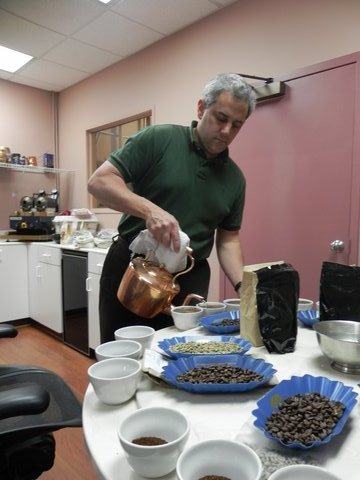 Coffee Cupping - Pouring hot water over the grinds